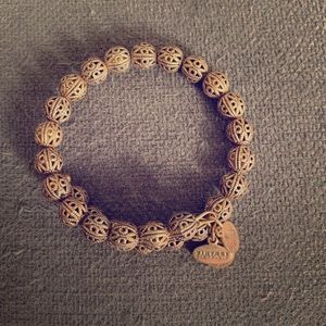 Gold Alex and Ani Vintage Sixty-Six bracelet